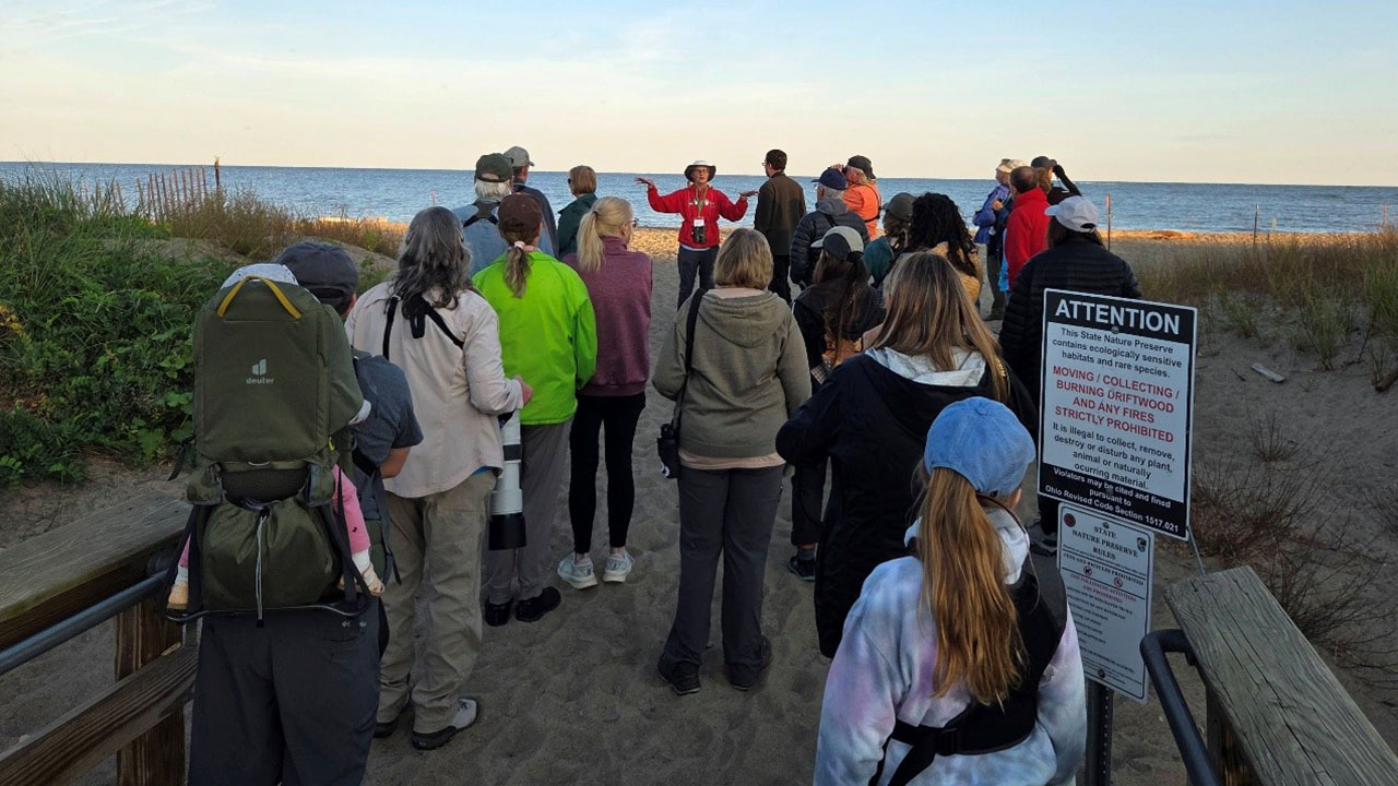 Attendees of the Headlands Birding Festival assembling at Headlands Dunes State Nature Preserve
