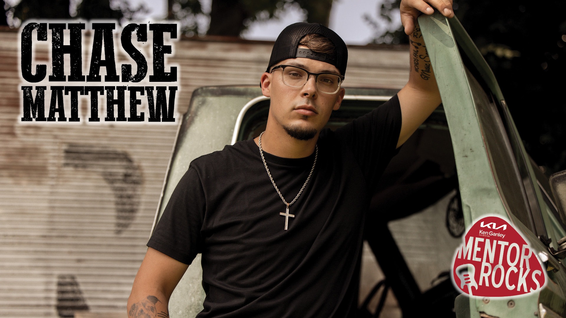 A photo of country artist Chase Matthew along with his logo in the upper left and the Mentor Rocks logo in the bottom right.