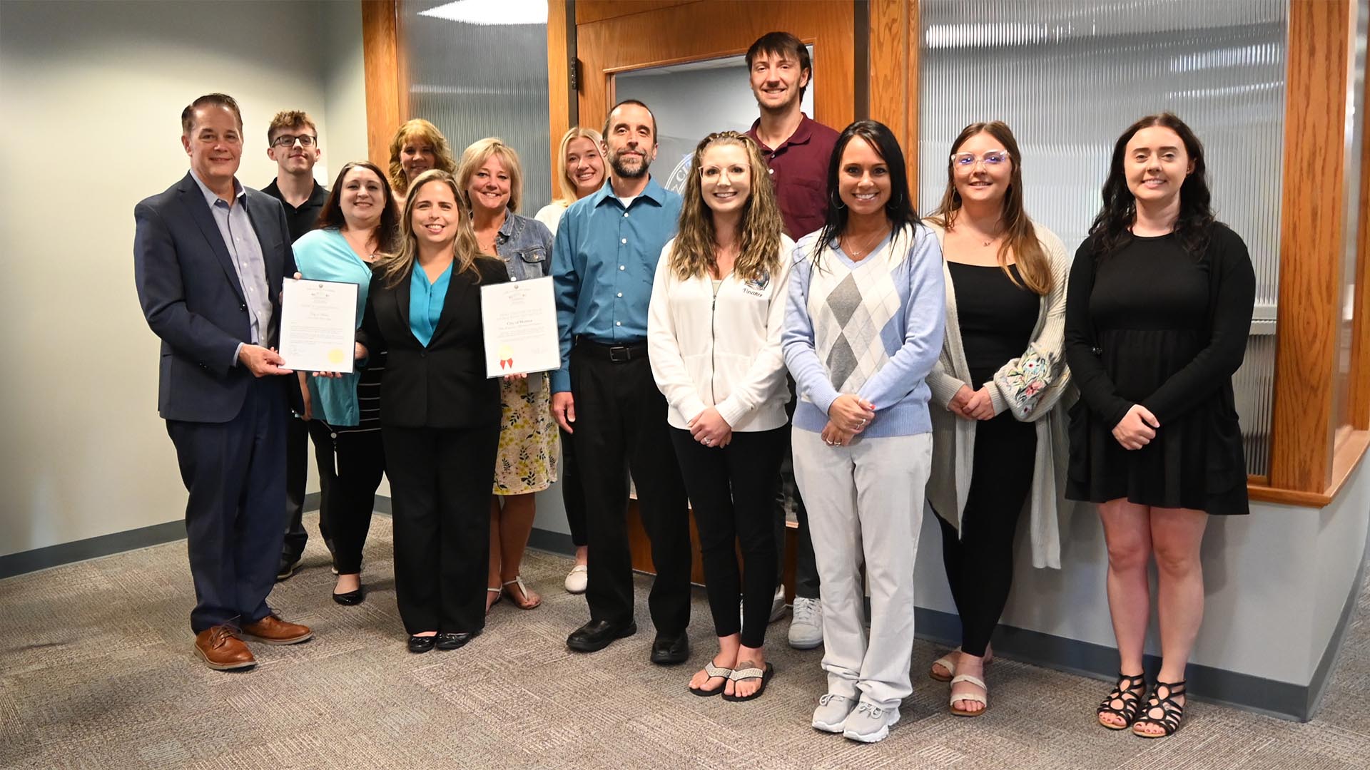 A group photo of the Mentor Finance Department as they accept the 2025 Award of Distinction from Ohio Auditor of State's Office on August 27, 2025