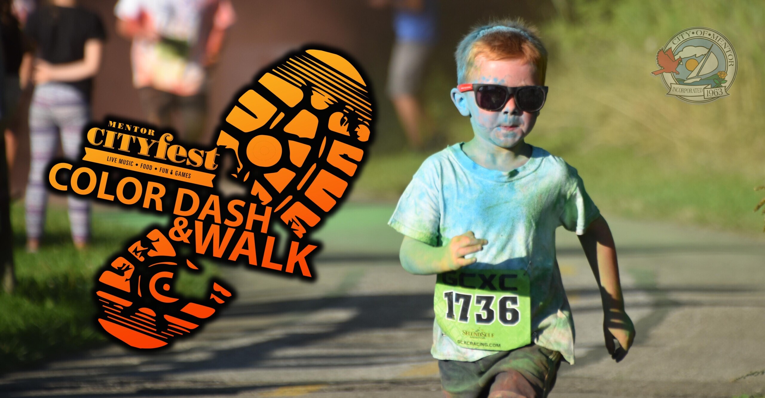 A young runner participating in the Mentor CityFest Color Dash & Walk.