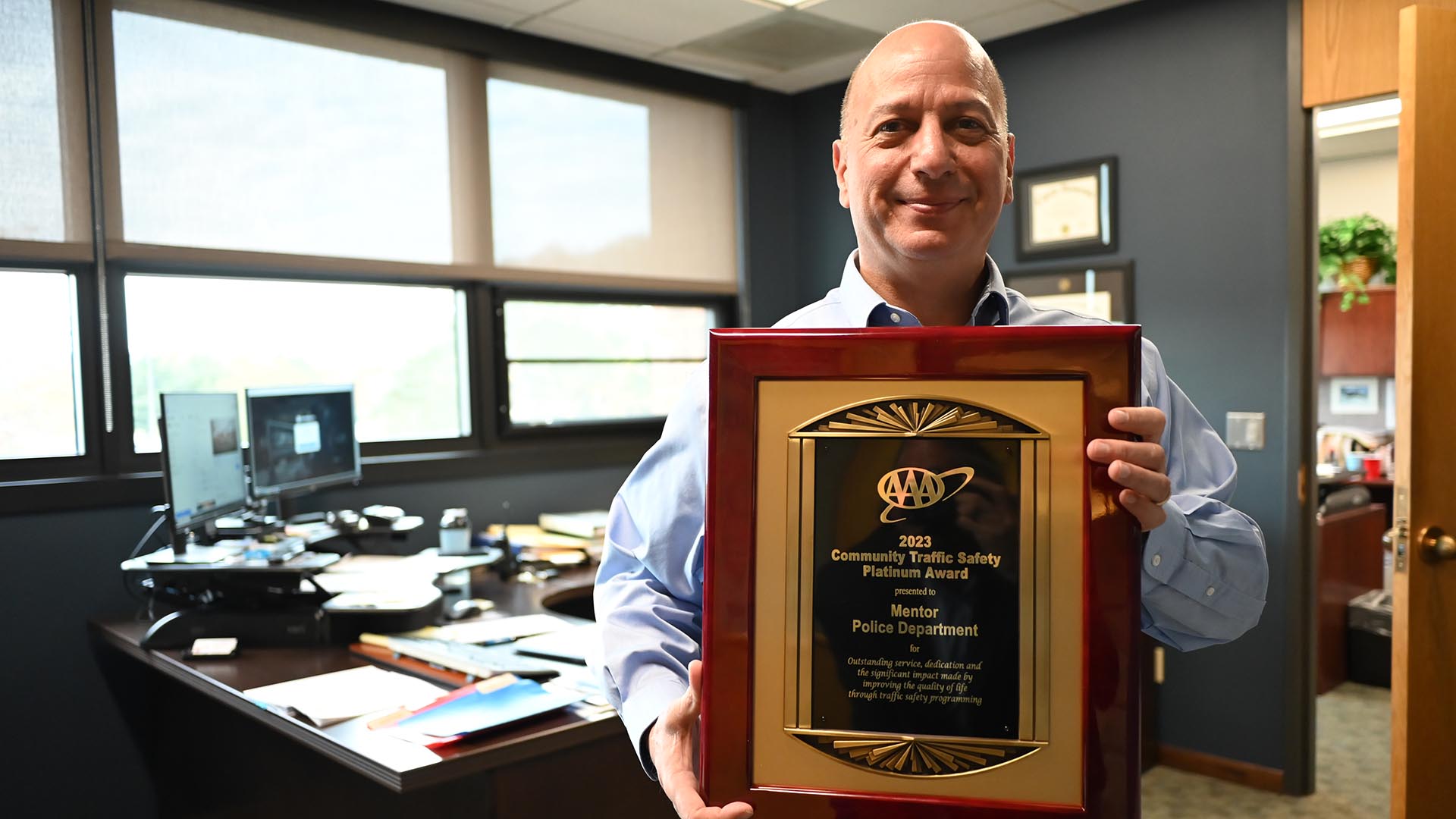 Mentor Police Chief Ken Gunsch with 2023 AAA Community Service Platinum Award